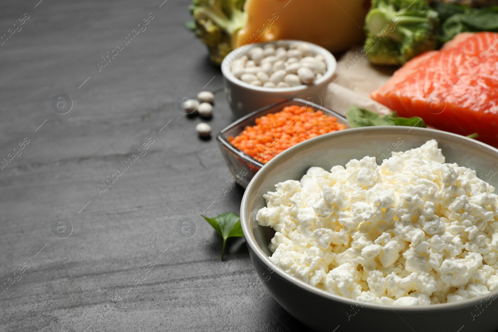 Photo of Products rich in protein on black table, closeup. Space for text