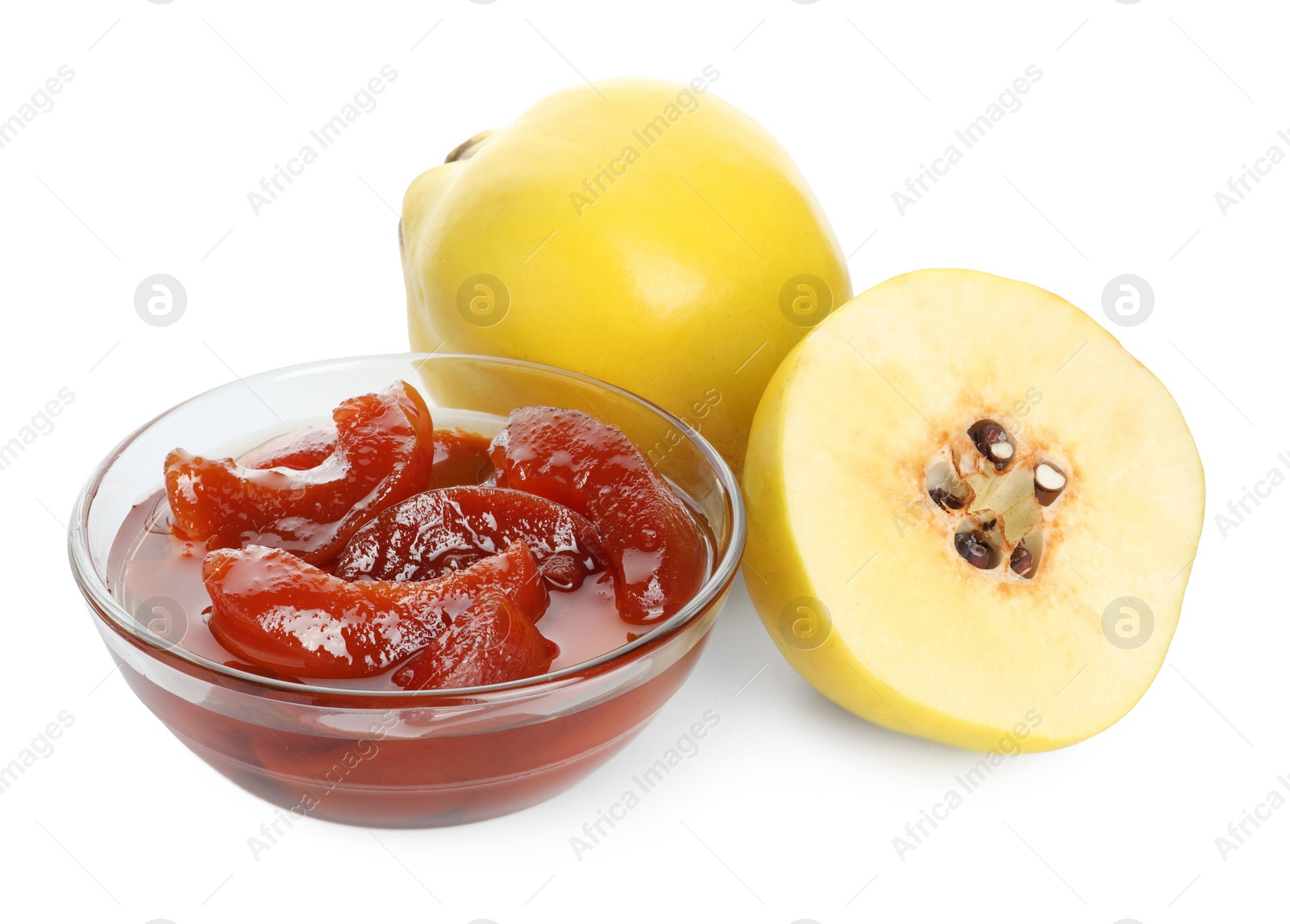 Photo of Tasty homemade quince jam in bowl and fruits isolated on white