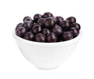 Photo of Ceramic bowl with fresh acai berries on white background