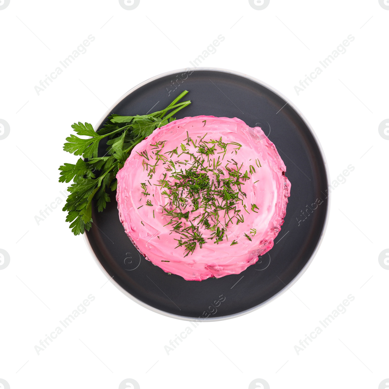 Photo of Herring under fur coat salad isolated on white, top view. Traditional Russian dish