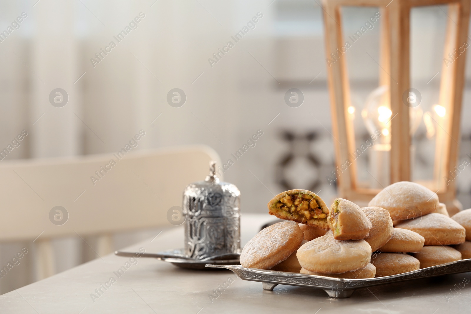 Photo of Traditional Islamic cookies on table, space for text. Eid Mubarak