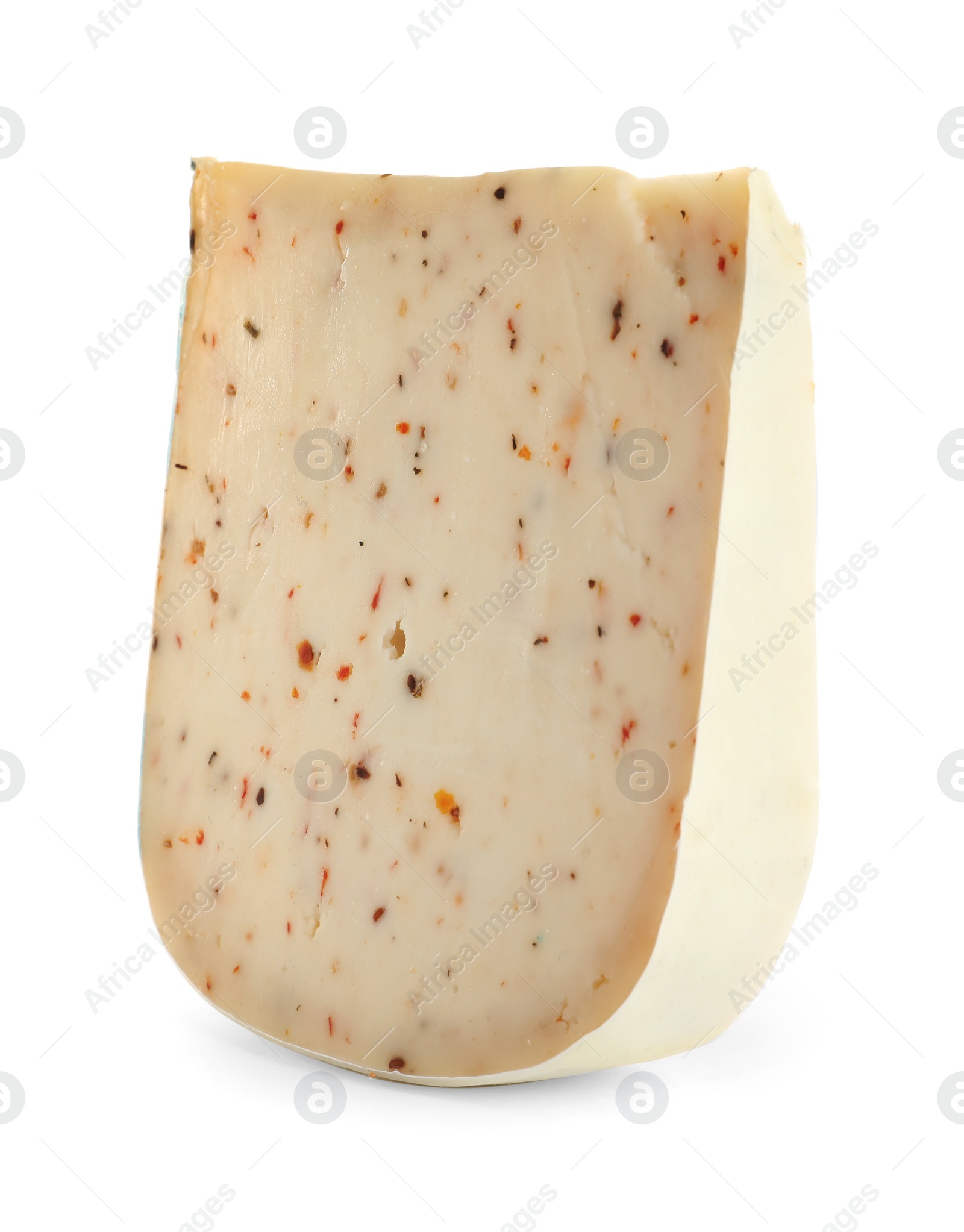 Photo of Piece of tasty cheese with basil and paprika isolated on white