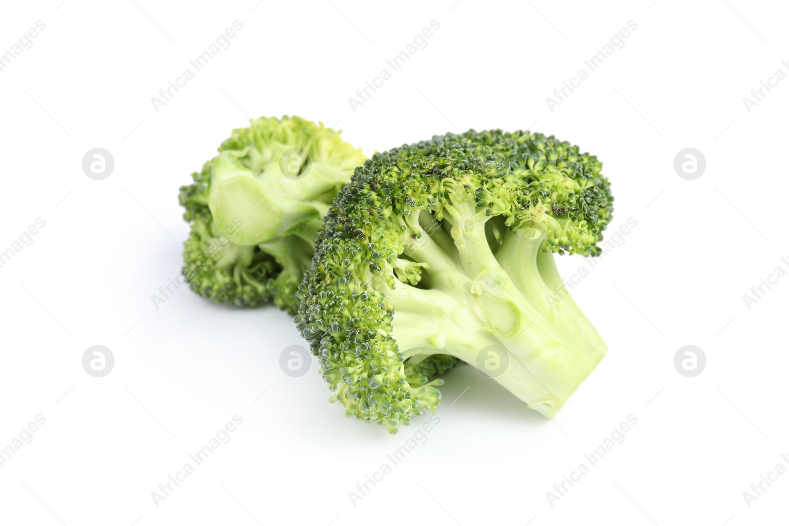 Photo of Fresh green broccoli on white background. Organic food