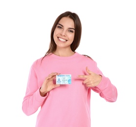 Photo of Happy young woman with driving license on white background