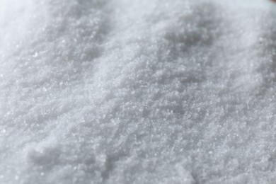 Photo of Organic white sea salt as background, closeup