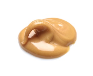 Creamy peanut butter on white background