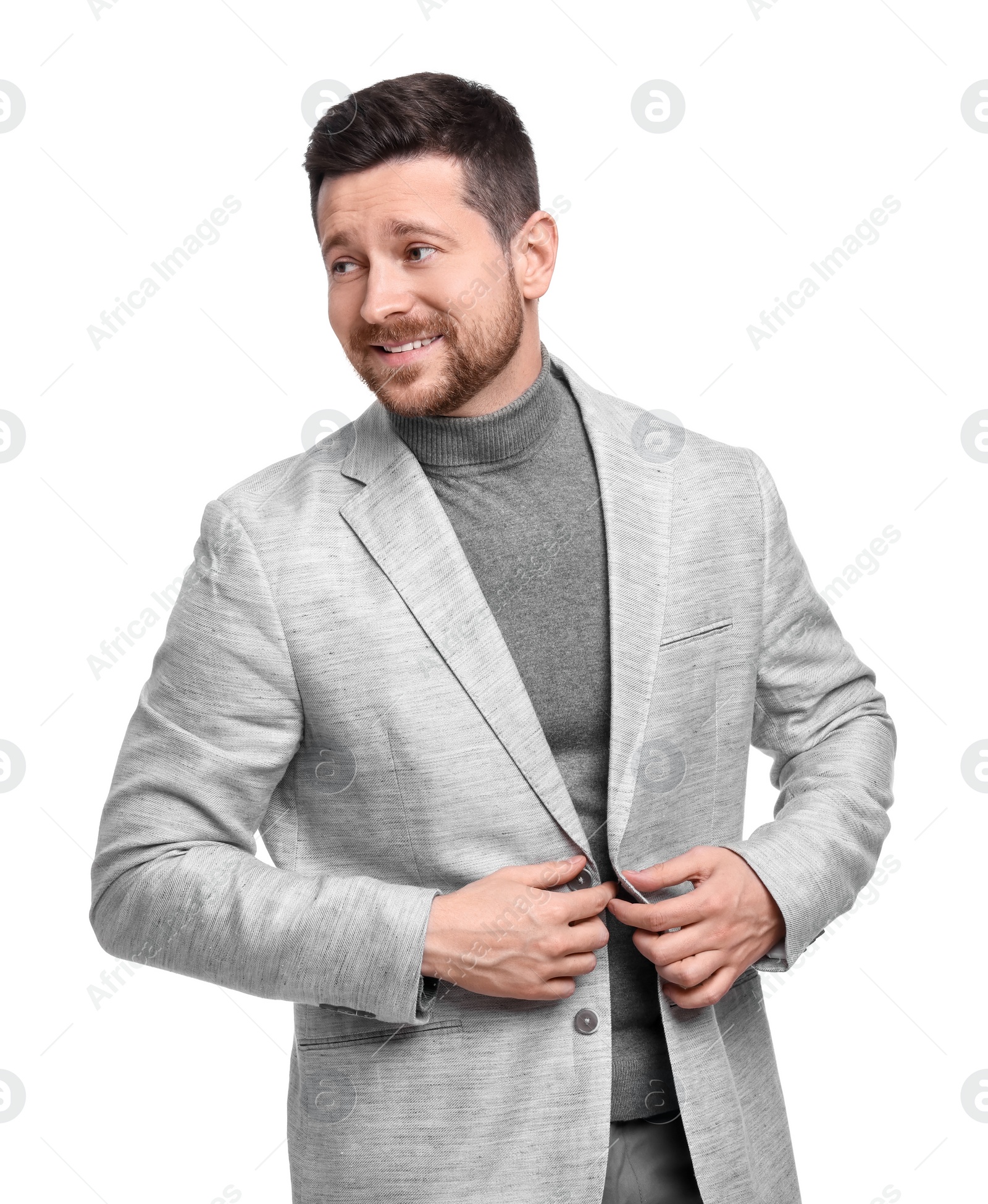 Photo of Handsome bearded businessman in suit on white background