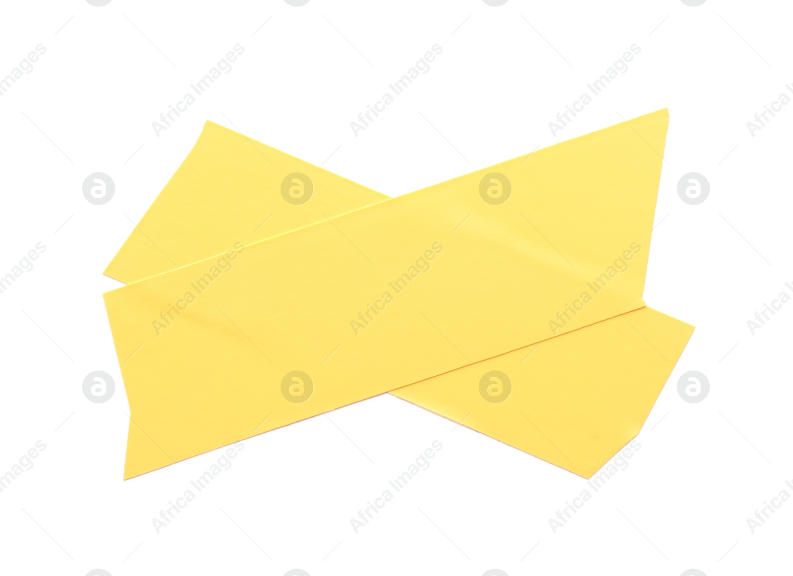 Photo of Cross of yellow insulating tape isolated on white, top view