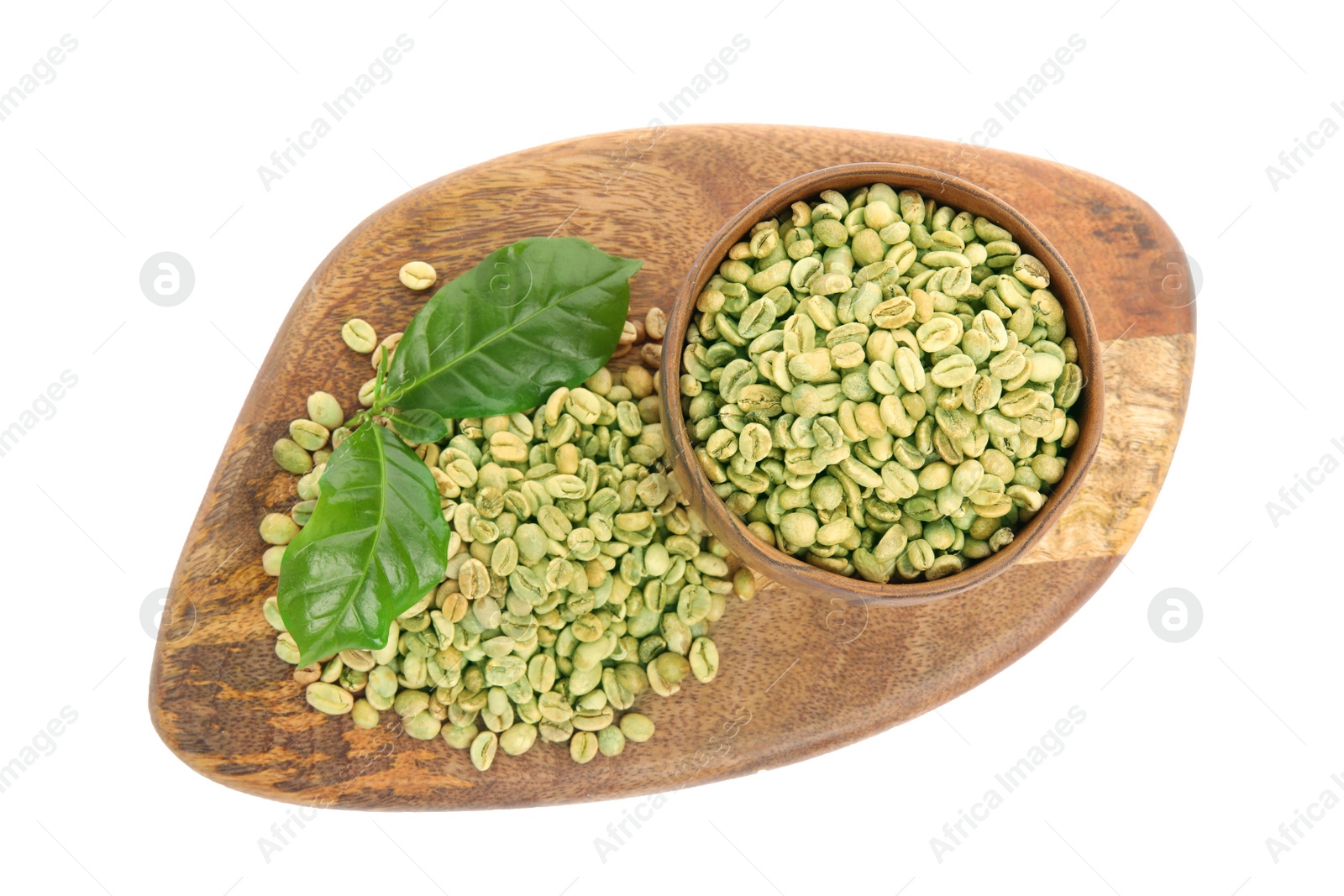 Photo of Wooden board with green coffee beans and fresh leaves on white background, top view