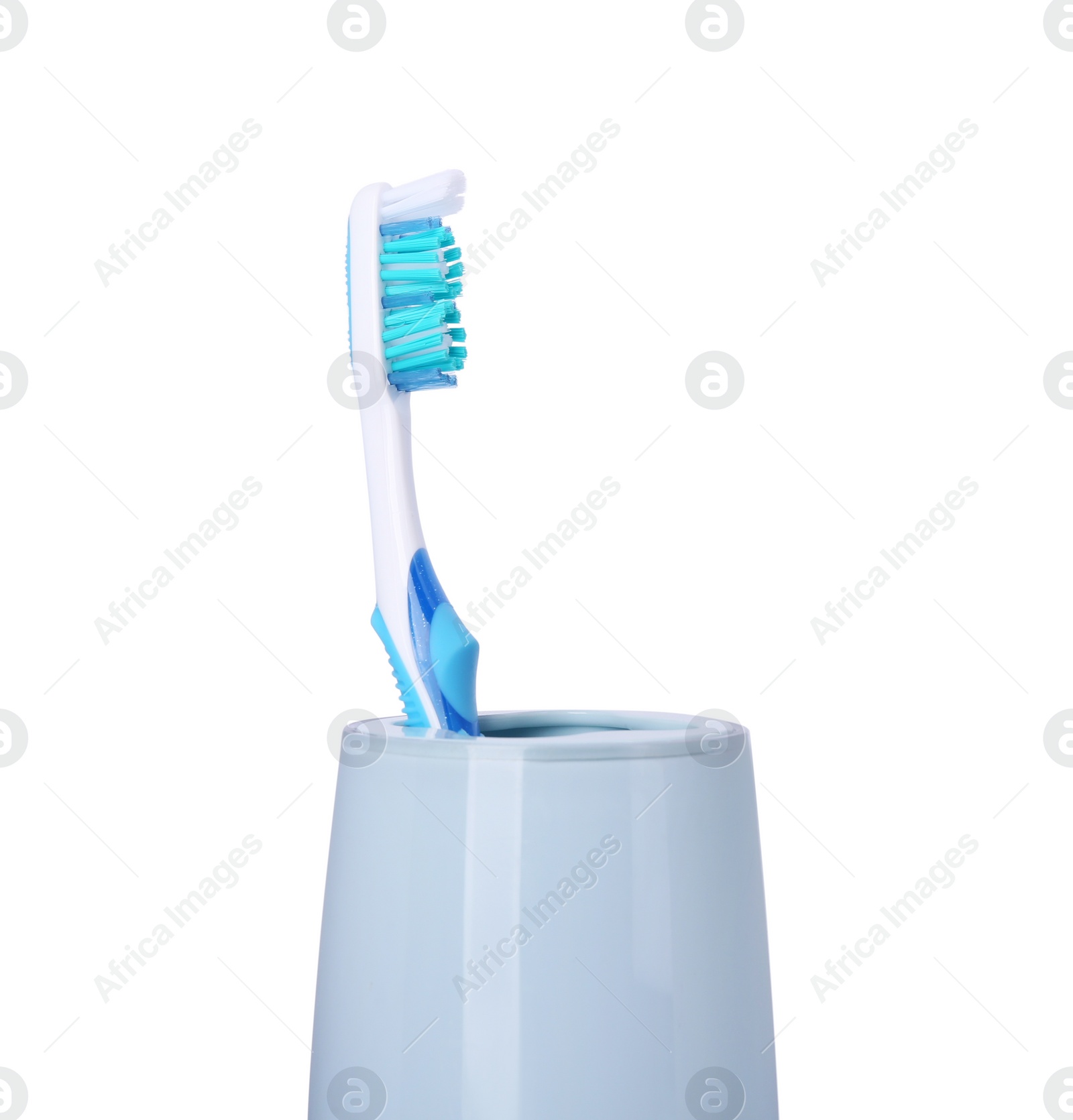 Photo of One plastic toothbrush in holder isolated on white