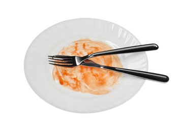 Photo of Dirty plate and cutlery on white background