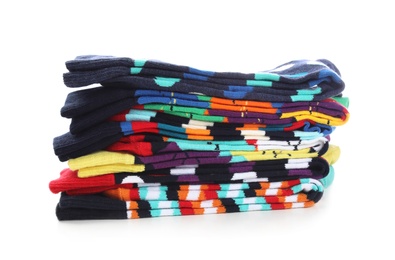 Photo of Many new colorful socks on white background