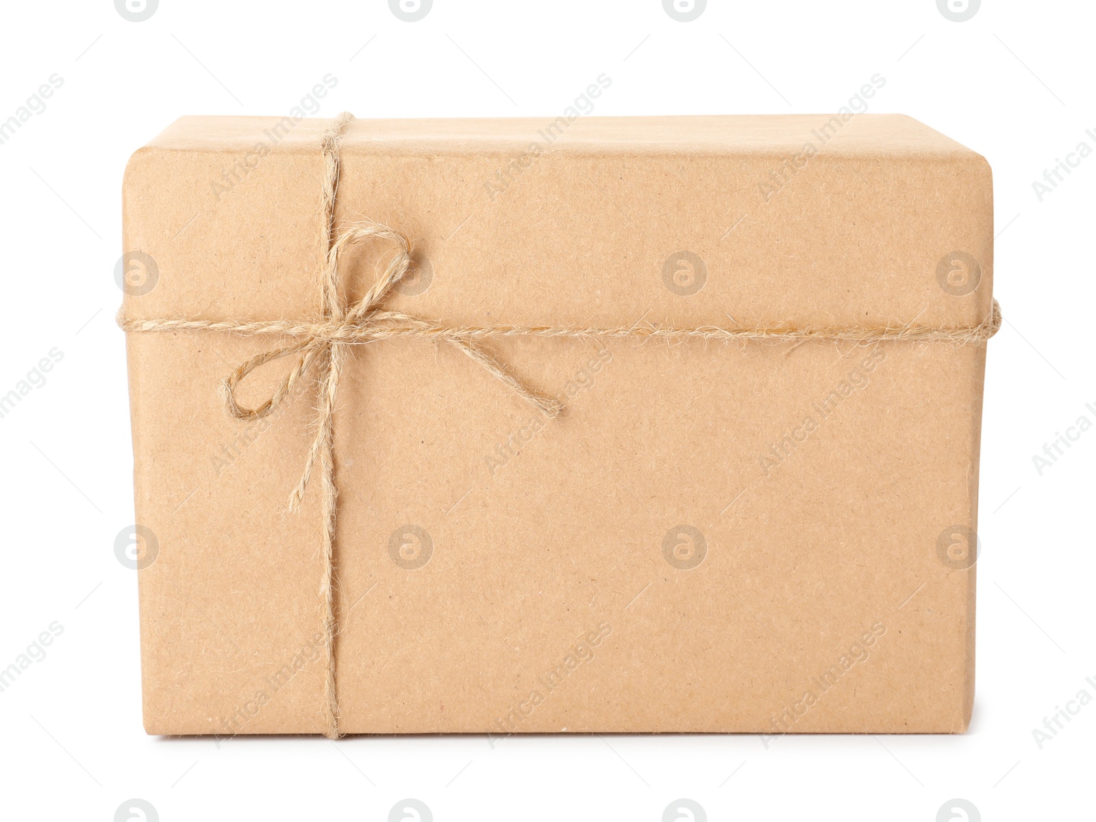 Photo of Parcel wrapped with kraft paper and twine isolated on white