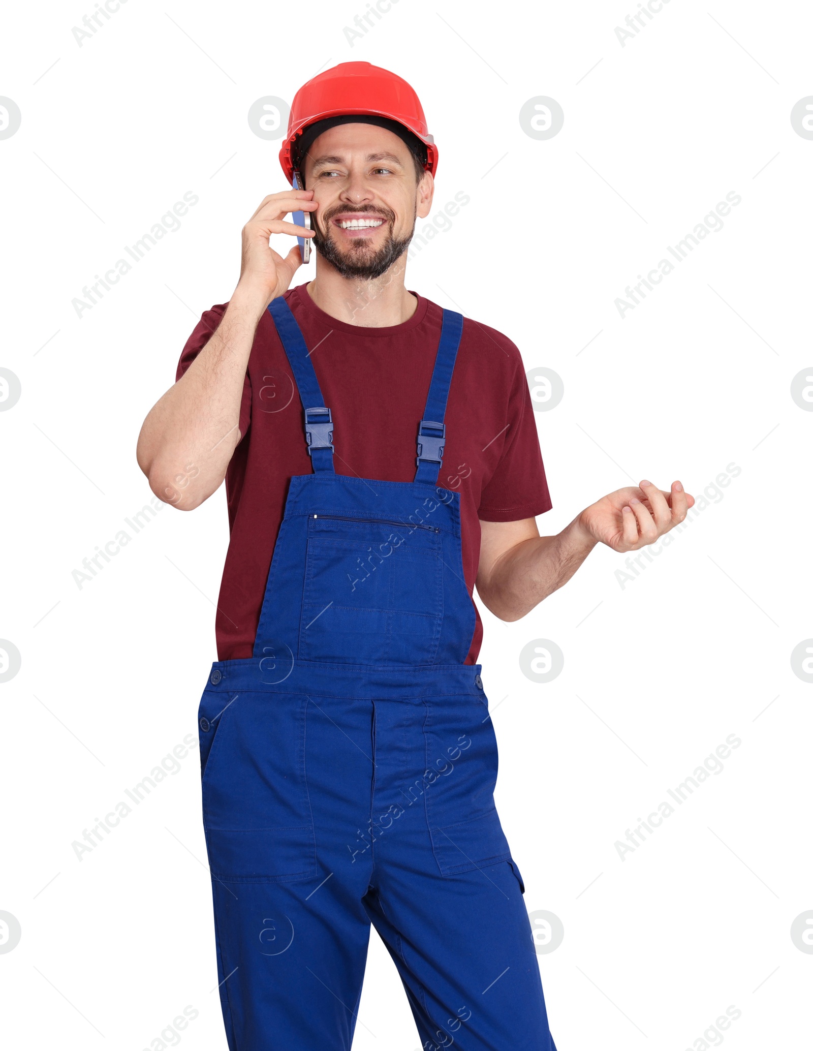 Photo of Professional repairman in uniform talking on phone against white background, space for text