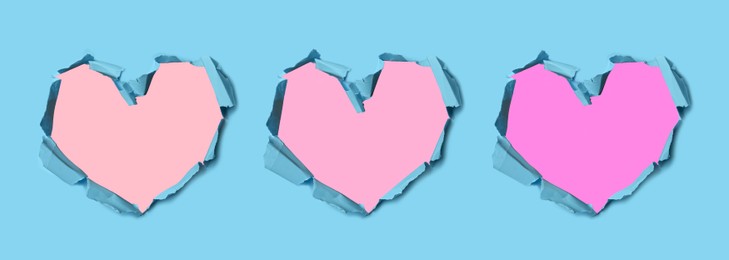 Image of Light blue paper with heart shaped holes on color background, collage design