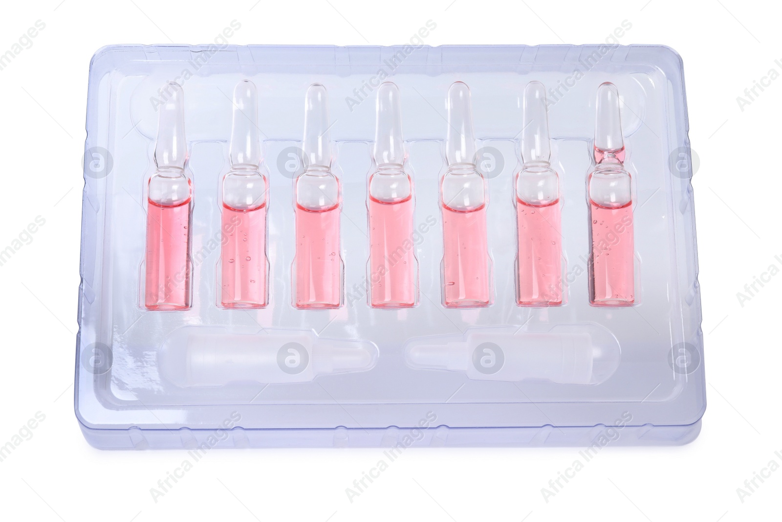 Photo of Glass ampoules with pharmaceutical product in tray on white background