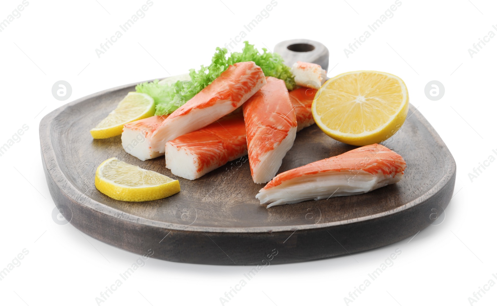 Photo of Serving plate with pieces of crab sticks on white background, closeup