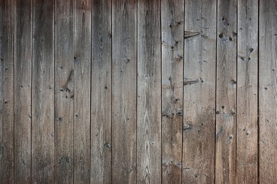 Photo of Row of wooden planks as background, fence texture