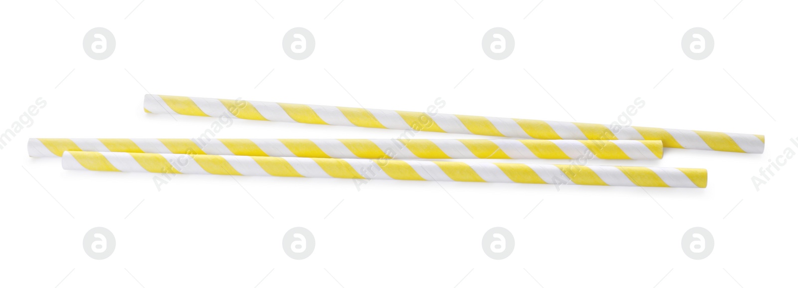 Photo of Striped paper cocktail straws on white background