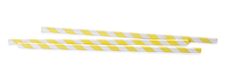 Photo of Striped paper cocktail straws on white background