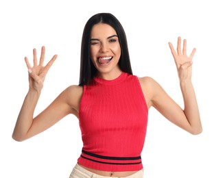 Photo of Woman showing number eight with her hands on white background