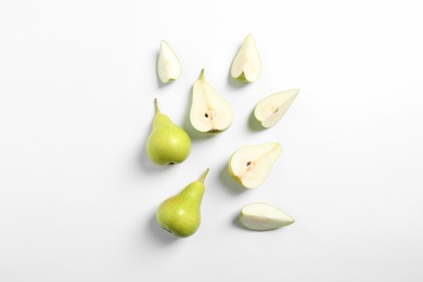 Photo of Ripe juicy pears on white background, top view