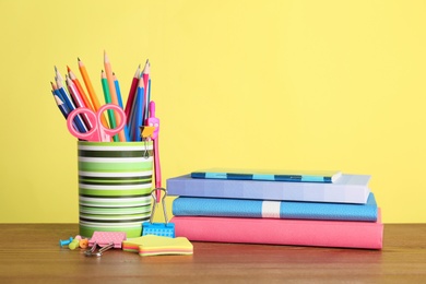 Photo of Different colorful stationery on table. Back to school