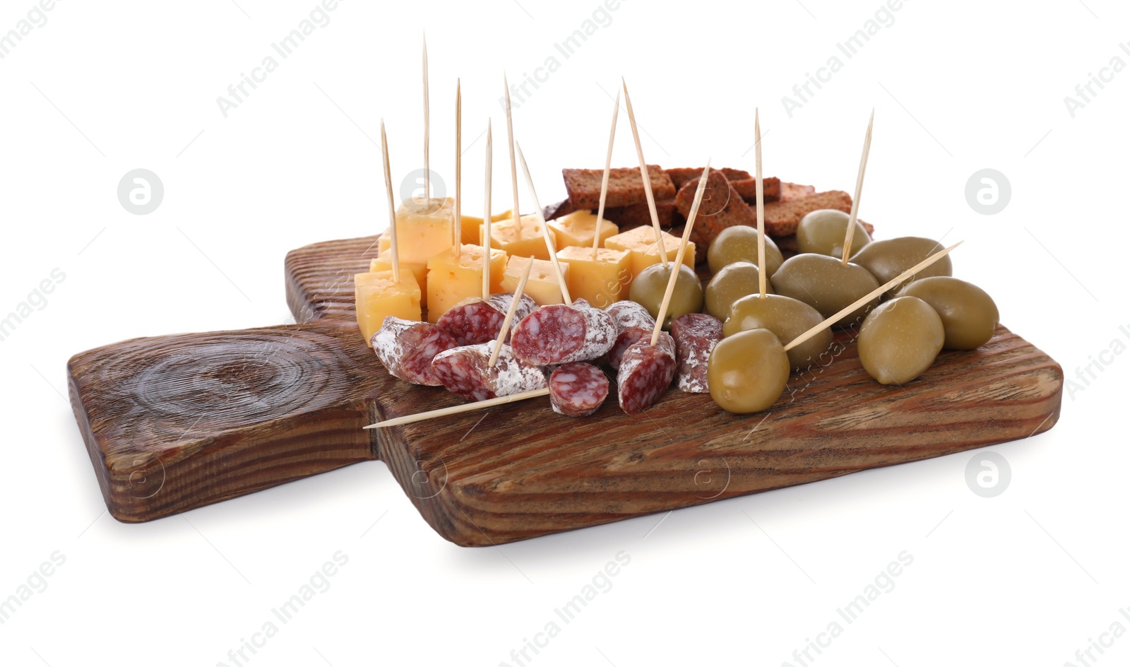 Photo of Toothpick appetizers. Tasty cheese, sausage, croutons and olives on white background