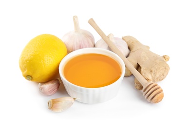 Photo of Composition with garlic and other cold remedies on white background