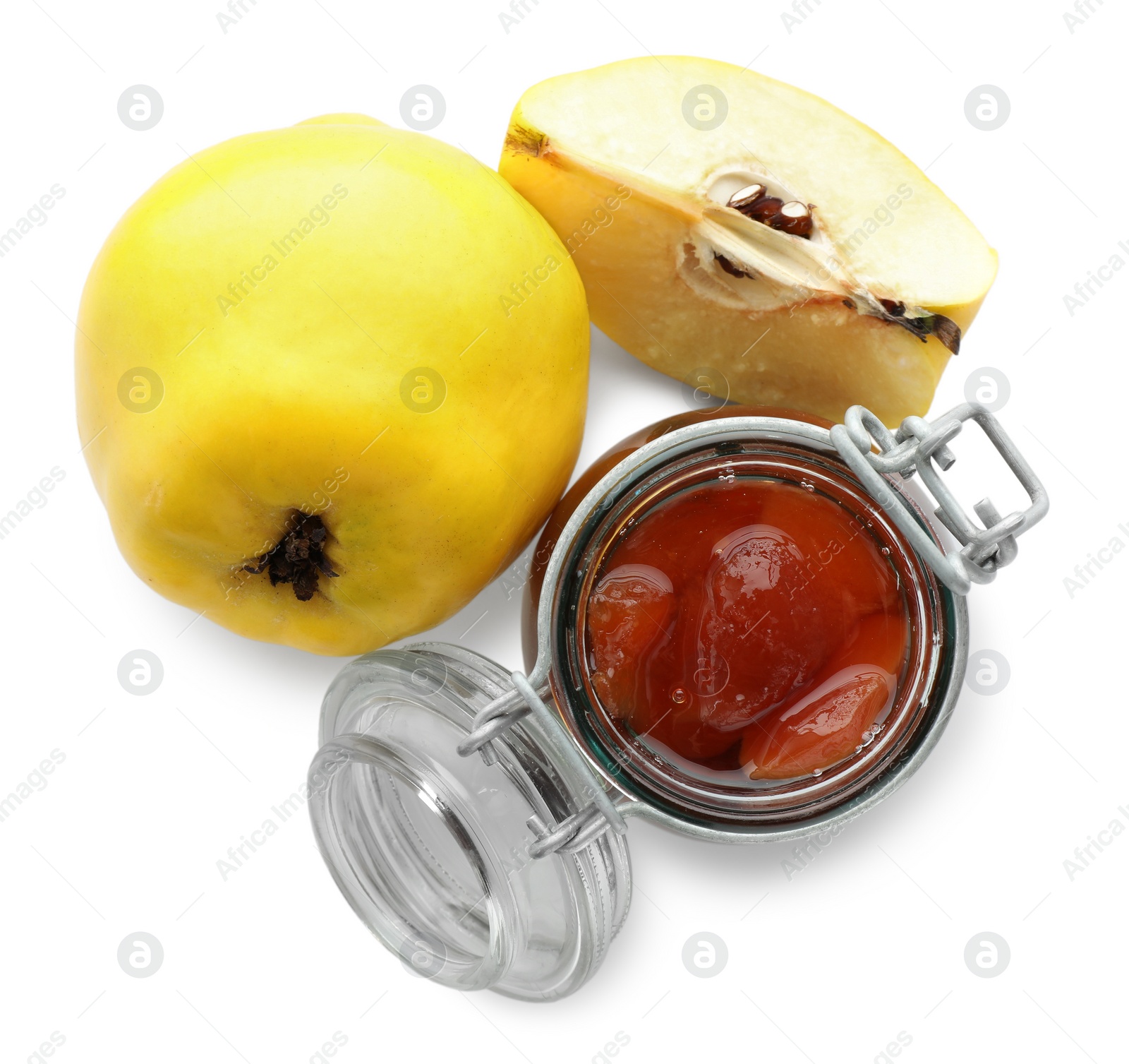 Photo of Tasty homemade quince jam in jar and fruits isolated on white, top view