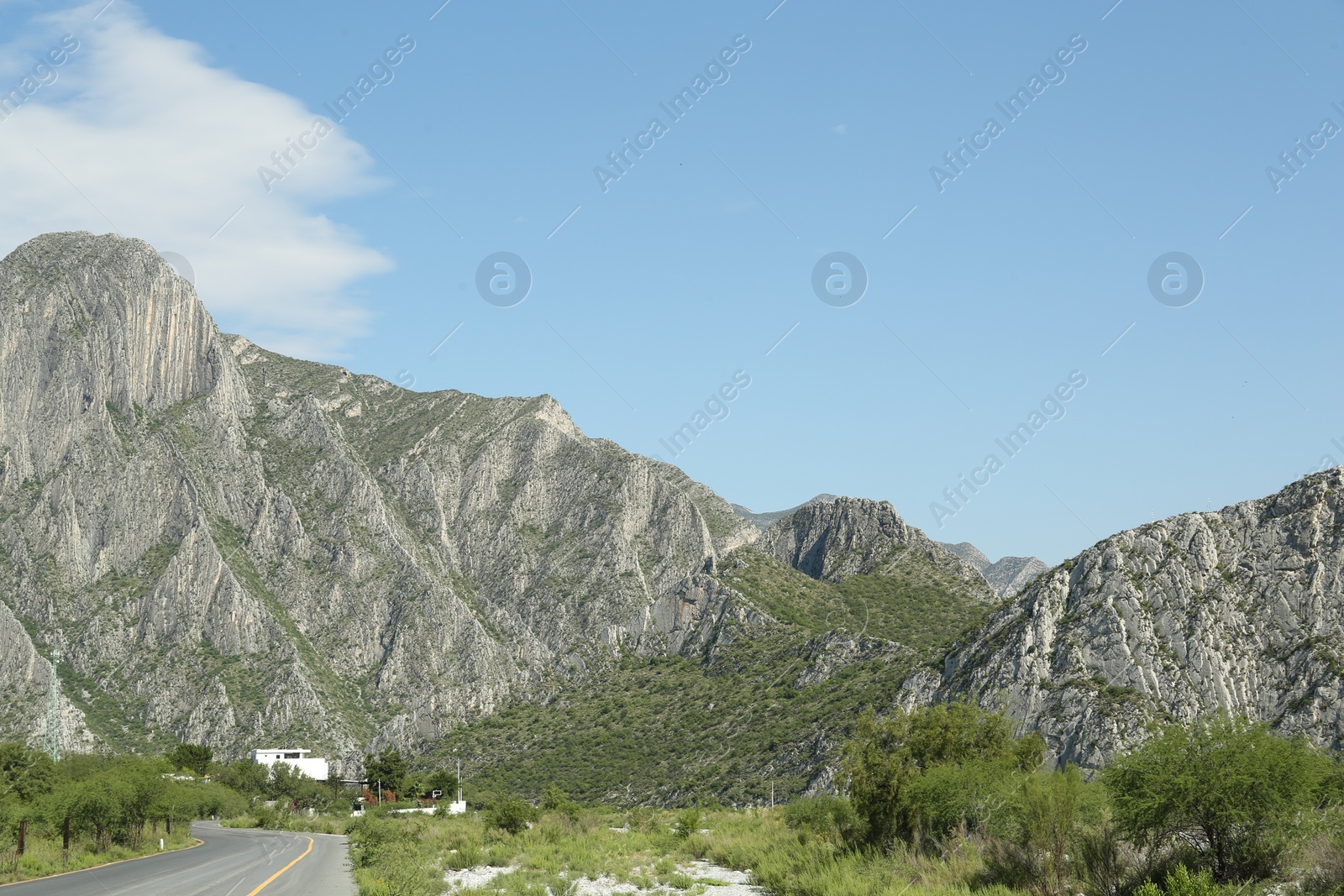 Photo of Picturesque landscape with high mountains under blue sky outdoors