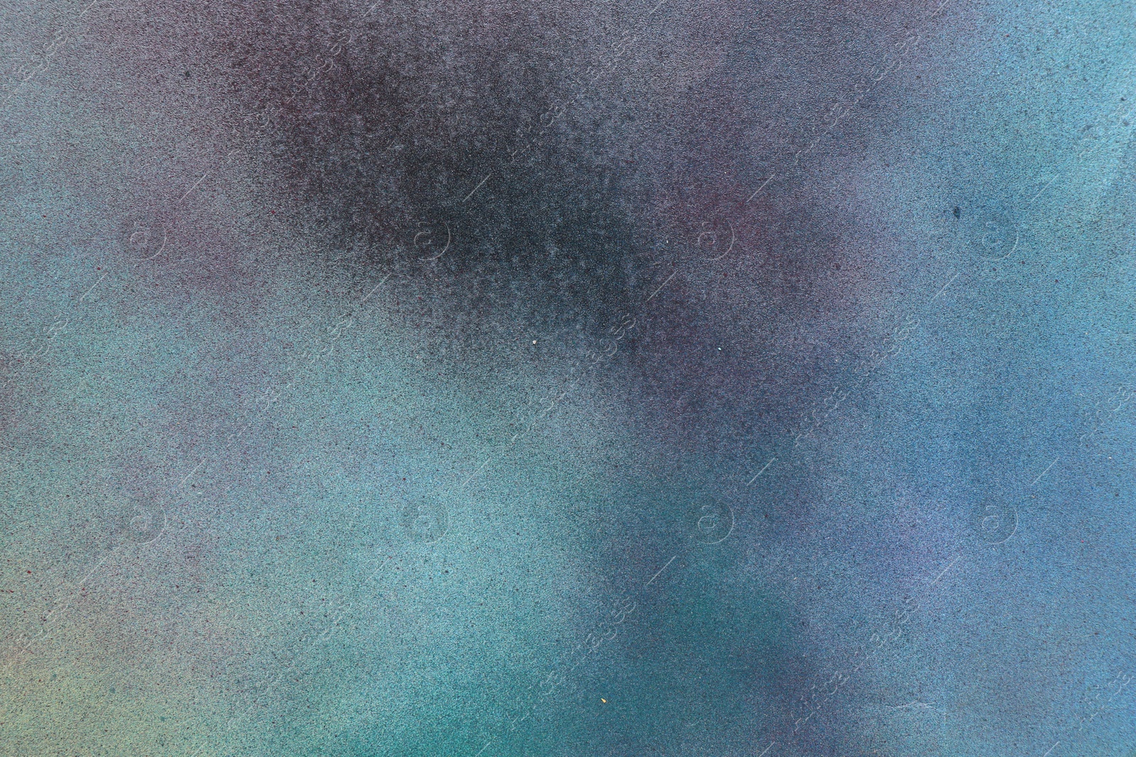 Photo of Texture of abstract spray paint as background, top view