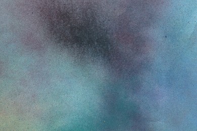 Photo of Texture of abstract spray paint as background, top view