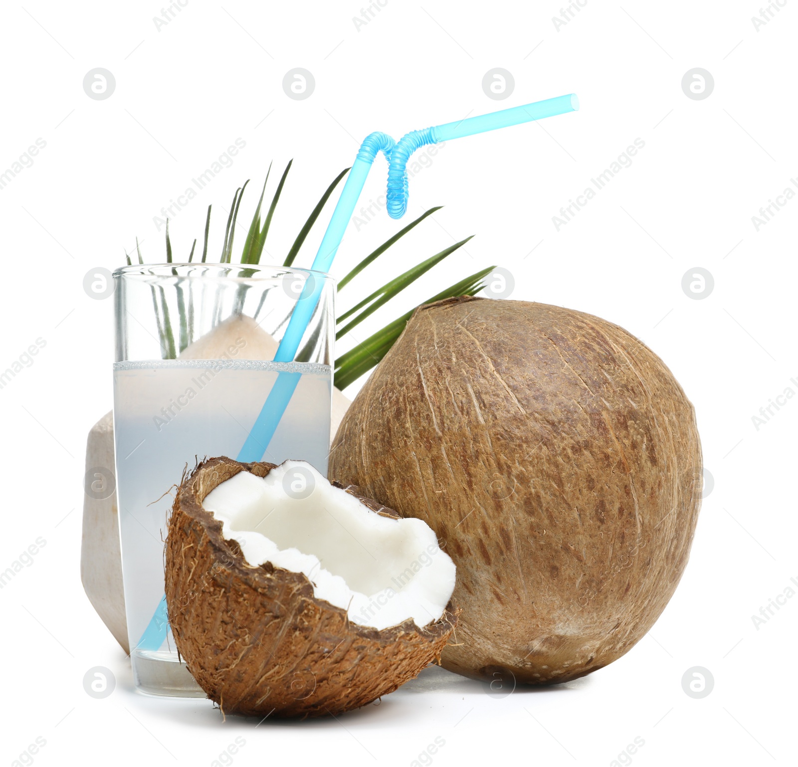 Photo of Glass of coconut milk and nuts on white background