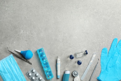 Photo of Flat lay composition with medical items and space for text on gray background