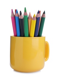 Colorful pencils in yellow cup on white background