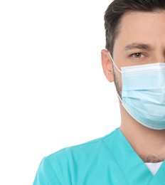 Doctor or medical assistant (male nurse) in uniform with protective mask on white background, closeup