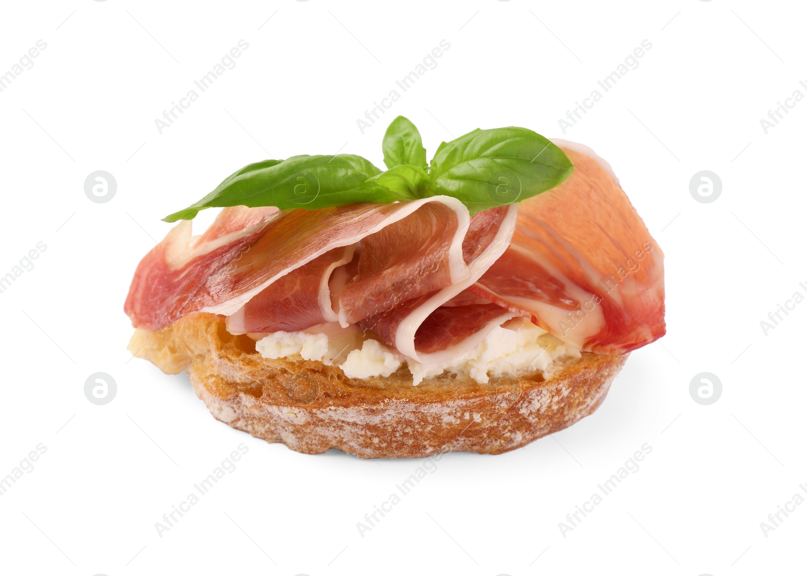 Photo of Tasty sandwich with cured ham, cream cheese and basil leaf isolated on white