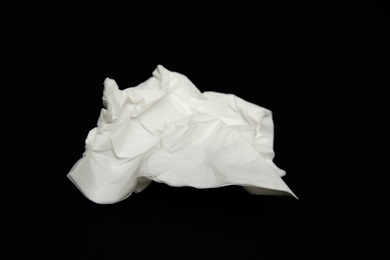 Used white paper tissue on black background