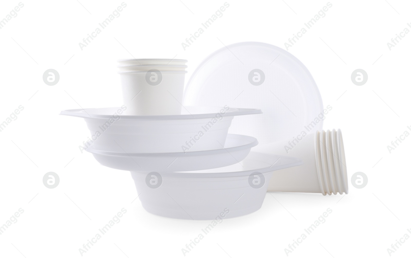 Photo of Set of disposable plastic dishware isolated on white