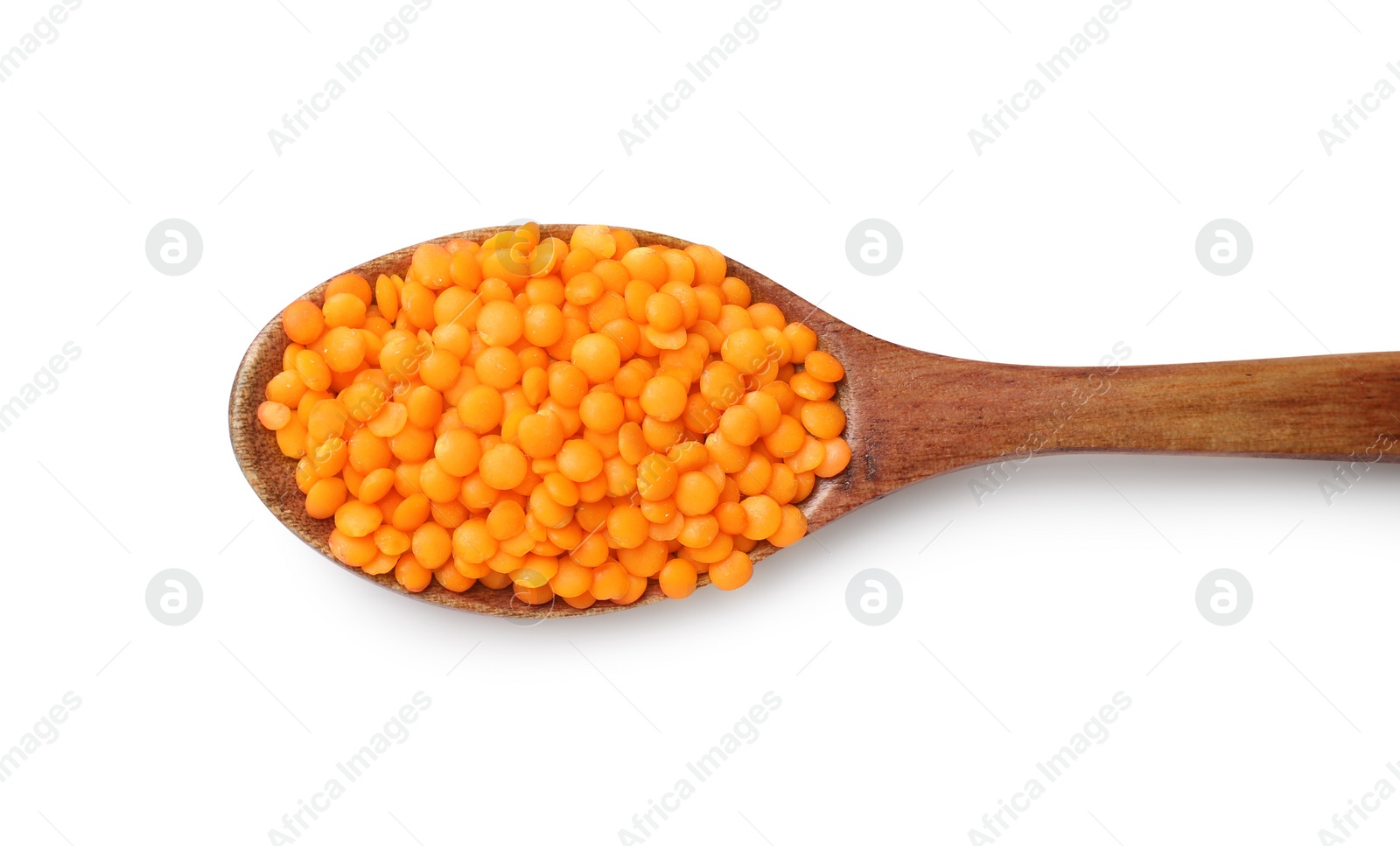 Photo of Wooden spoon with raw lentils isolated on white, top view