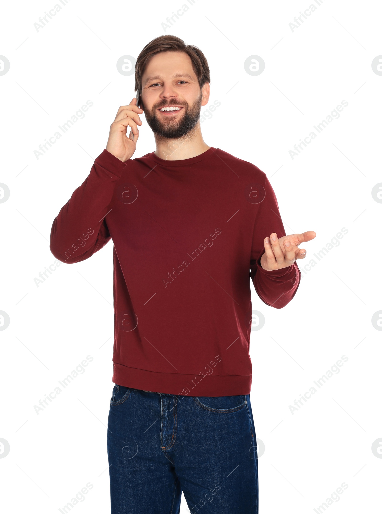 Photo of Man talking on smartphone against white background