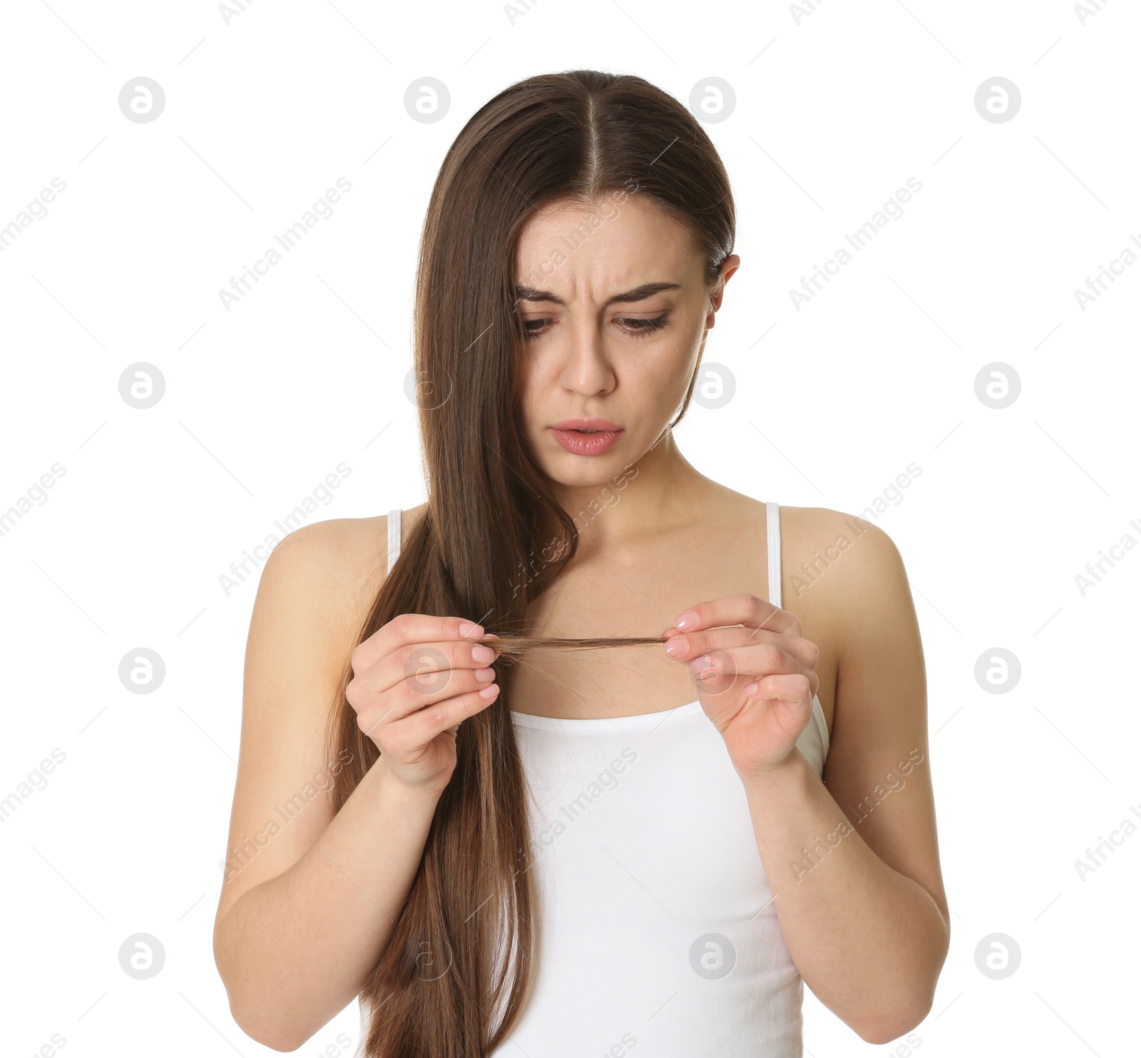 Photo of Emotional woman with damaged hair on white background