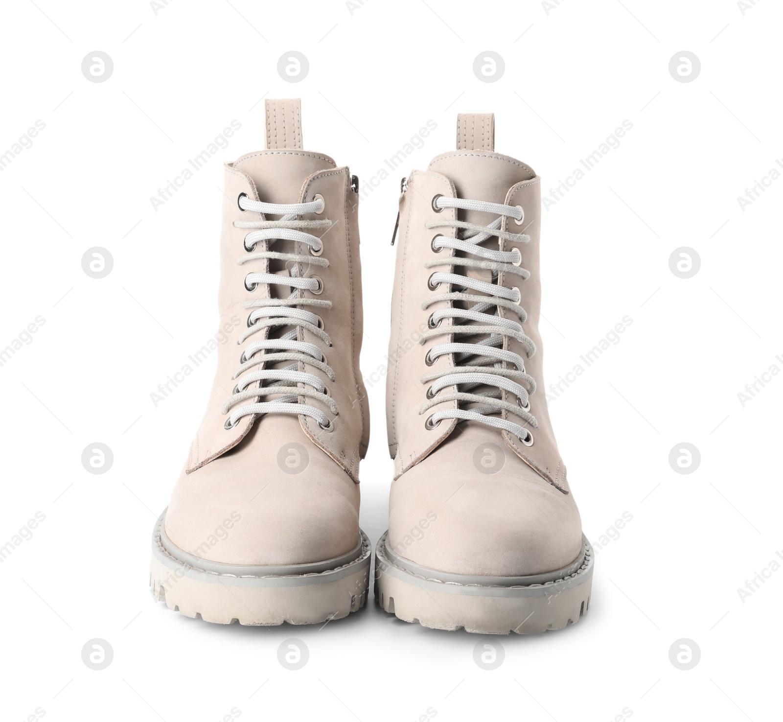 Photo of Pair of stylish boots on white background