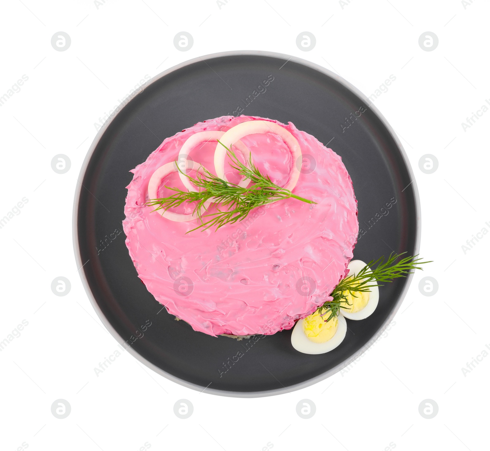 Photo of Herring under fur coat salad isolated on white, top view. Traditional Russian dish