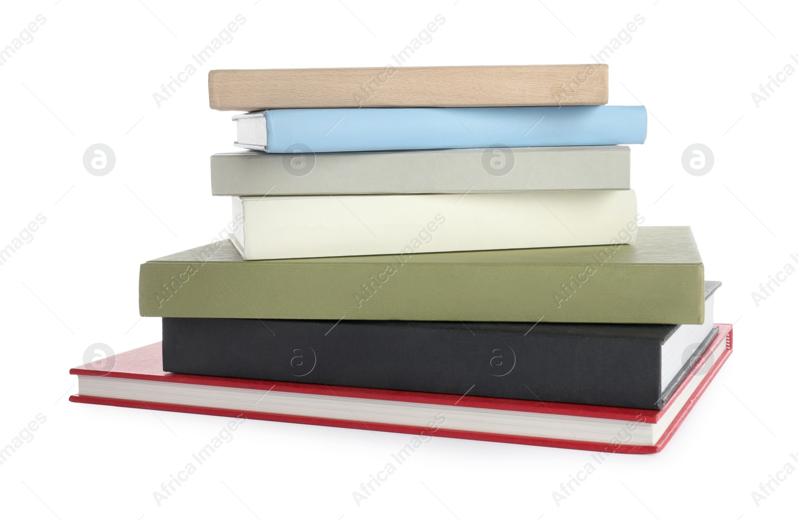 Photo of Stack of different books on white background