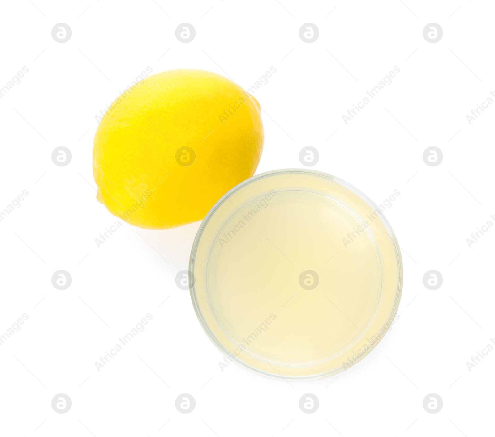 Photo of Freshly squeezed lemon juice on white background, top view