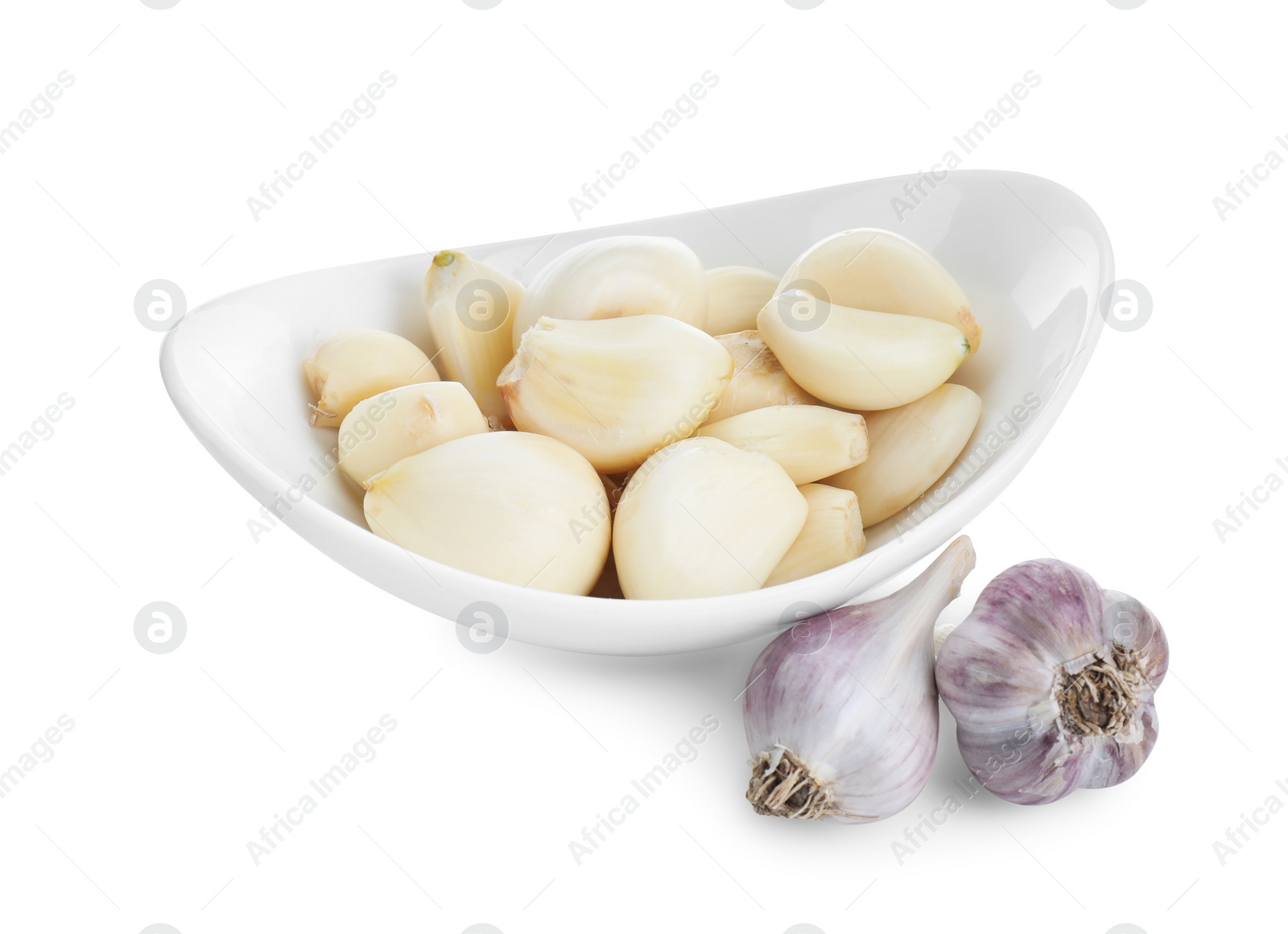 Photo of Bulbs and cloves of garlic isolated on white