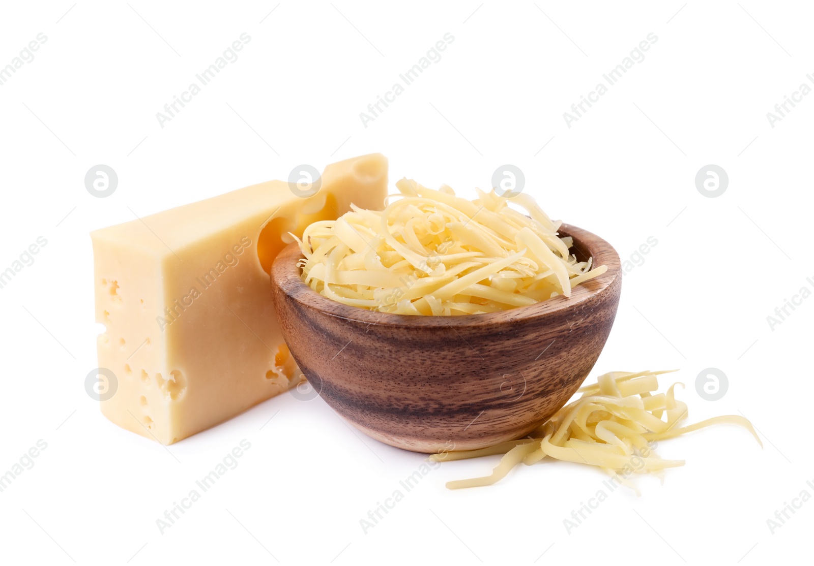 Photo of Grated cheese in bowl and piece of one isolated on white