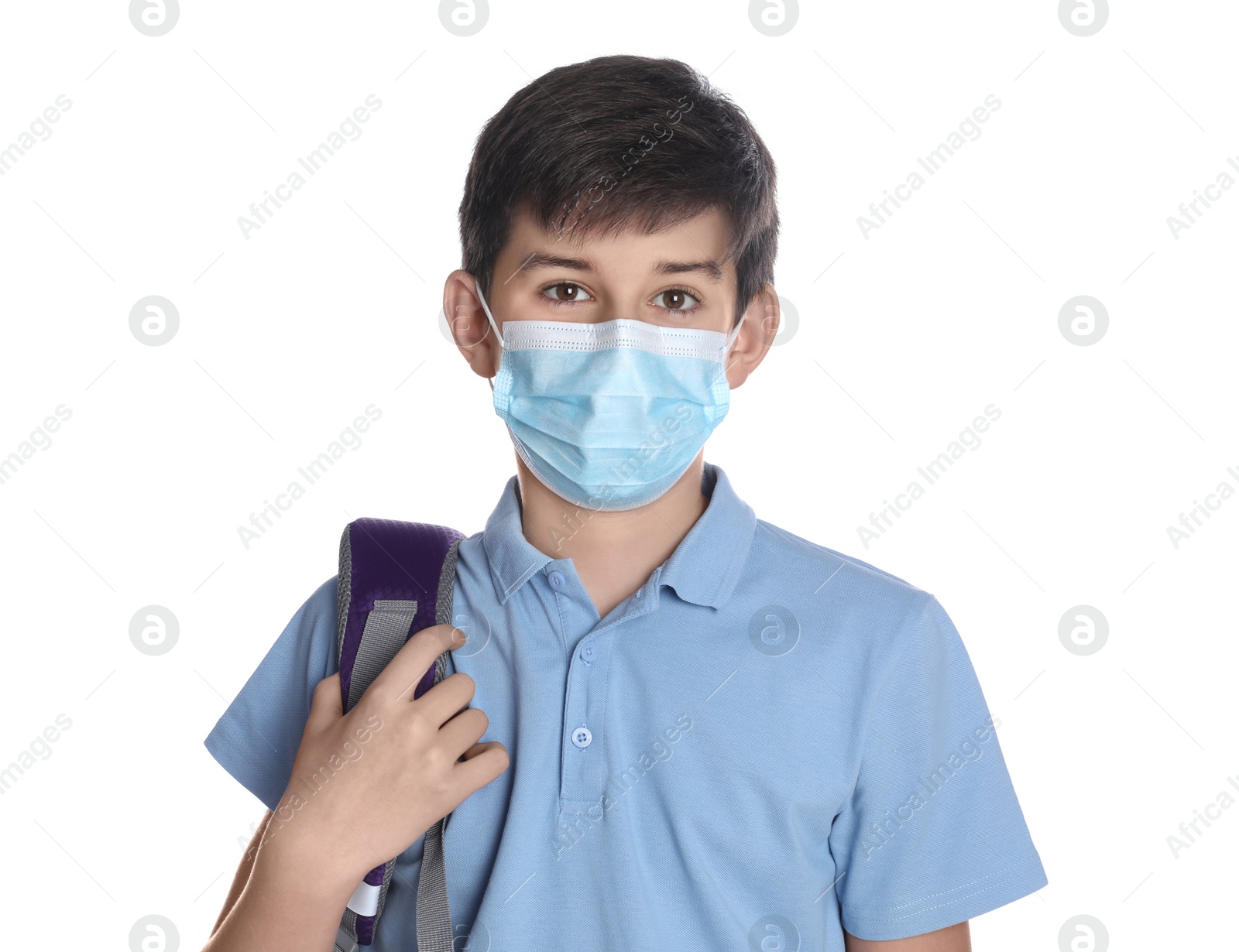 Photo of Boy wearing protective mask and backpack on white background. Child safety